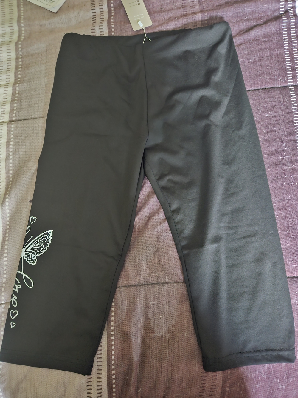 SHEIN Black Capri Leggings with Butterfly Accent. Says L But Run More Like A Sm